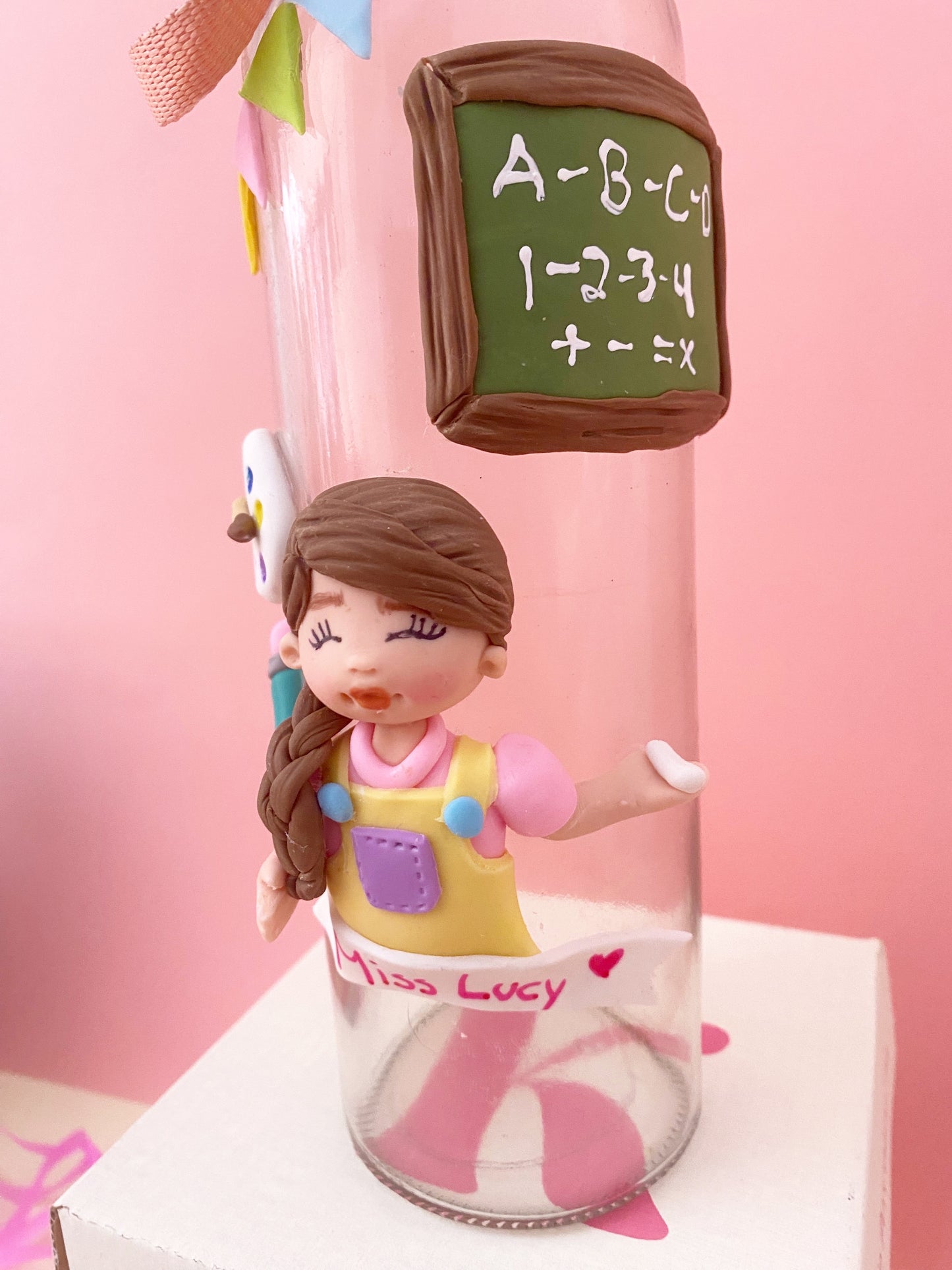 Botella de vidrio para maestra