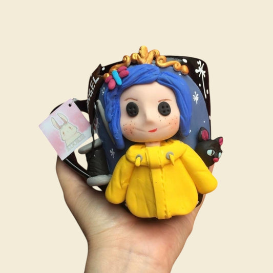 Taza Coraline