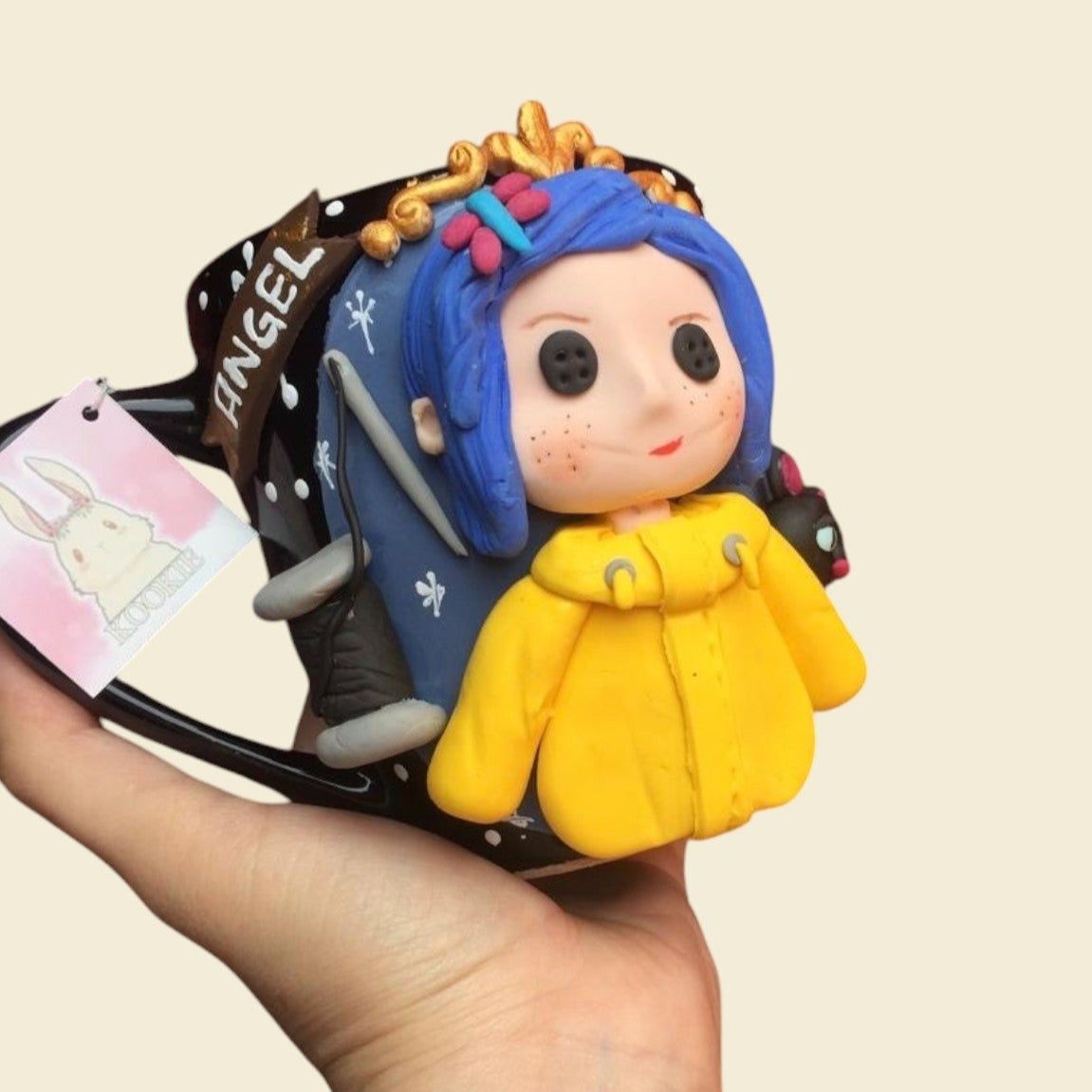 Taza Coraline
