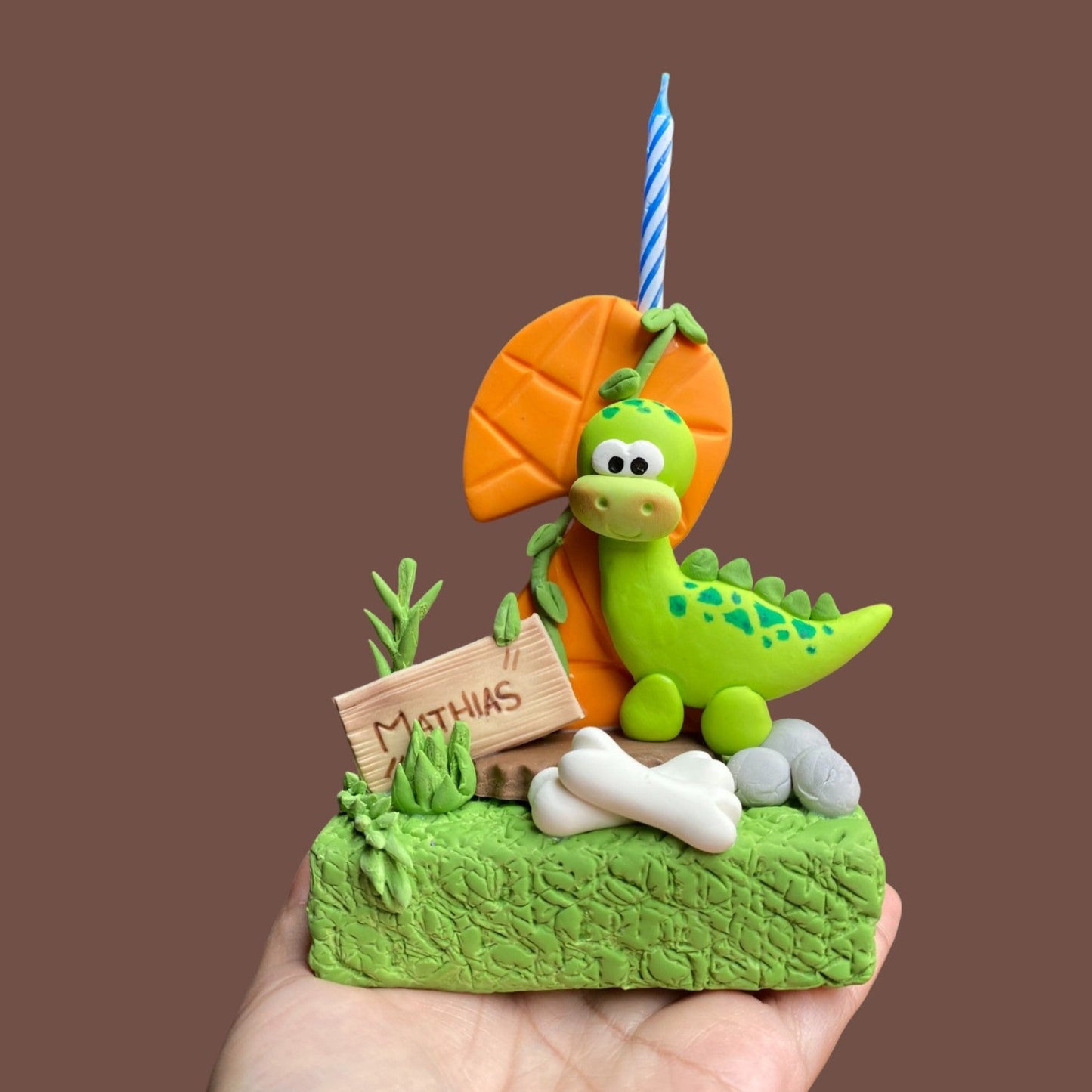Vela de número dinosaurio