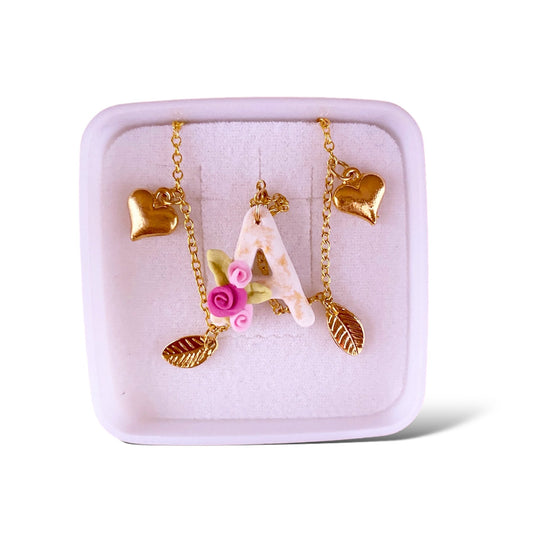 Collas de inicial floral